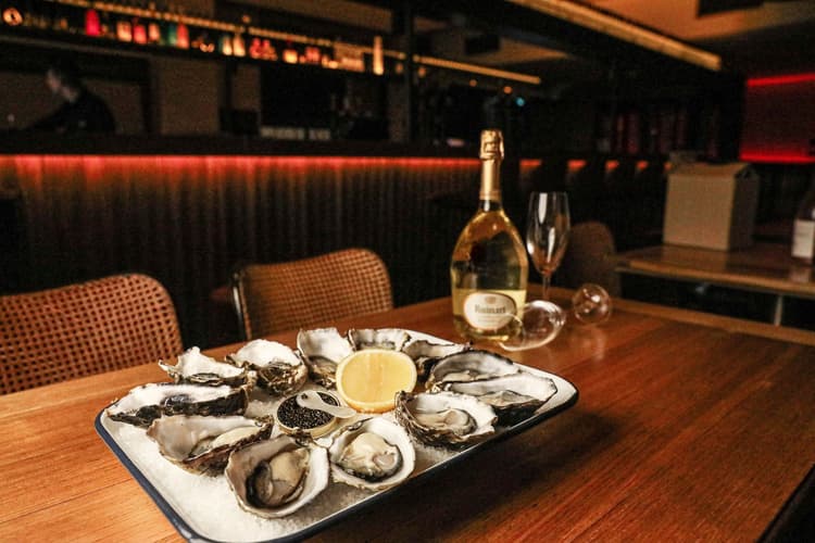 $2 Oyster Fridays | Happy Hour Drinks & Specials