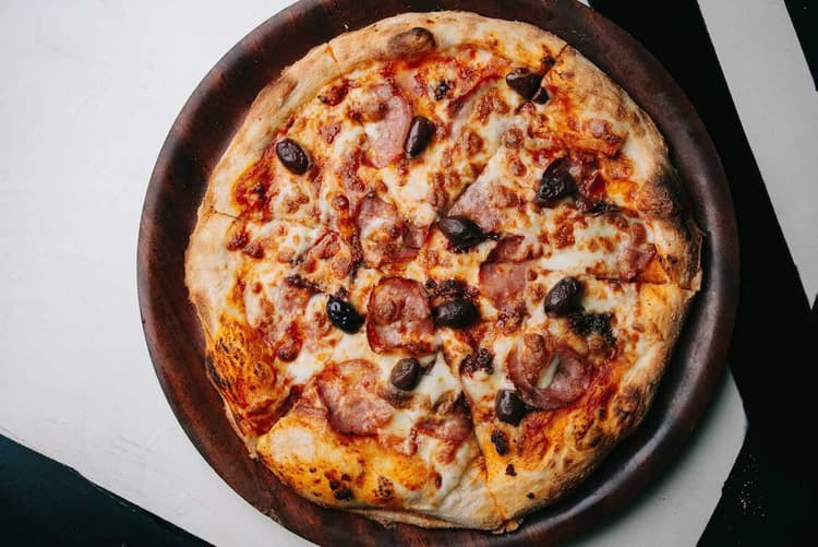 $16 Pizzas | Happy Hour Drinks & Specials