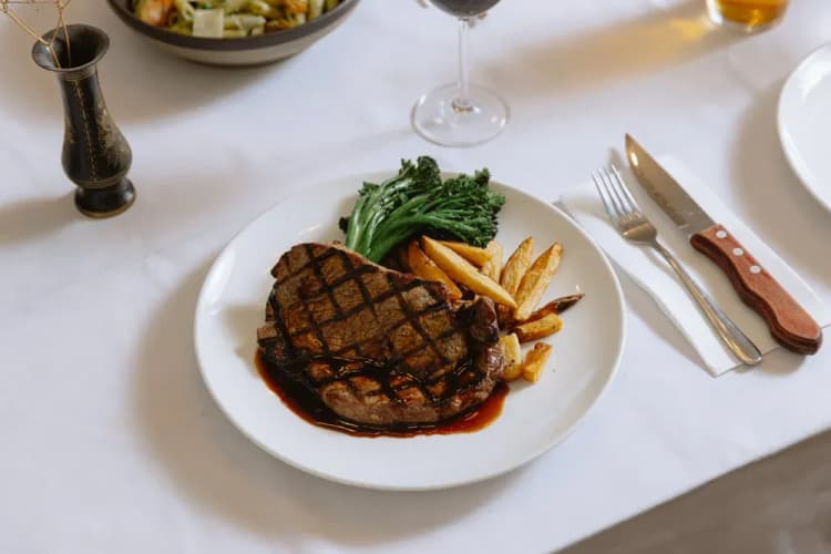 $27 Porterhouse | Happy Hour Drinks & Specials