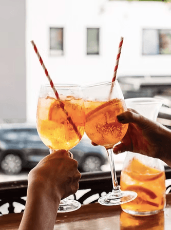 Sunset Spritz + $4 Oysters | Happy Hour Drinks & Specials