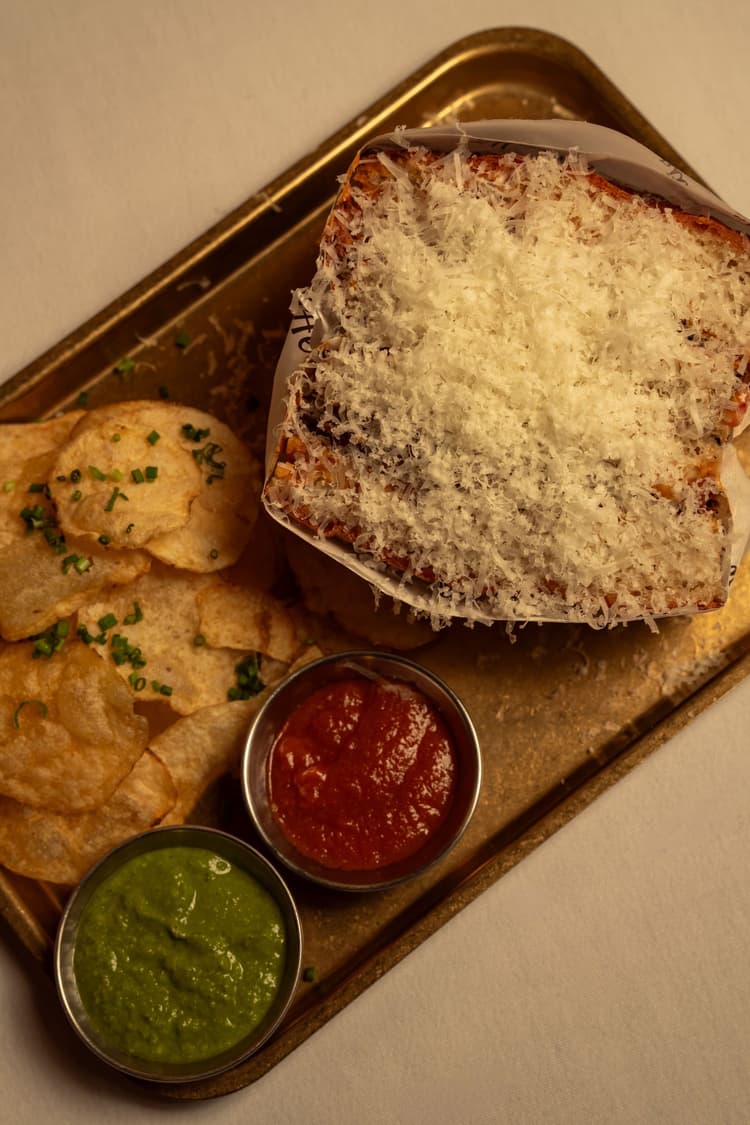Schiacciata & a Glass | Signature 8 hour chianti braised short rib schiacciata | Happy Hour Drinks & Specials